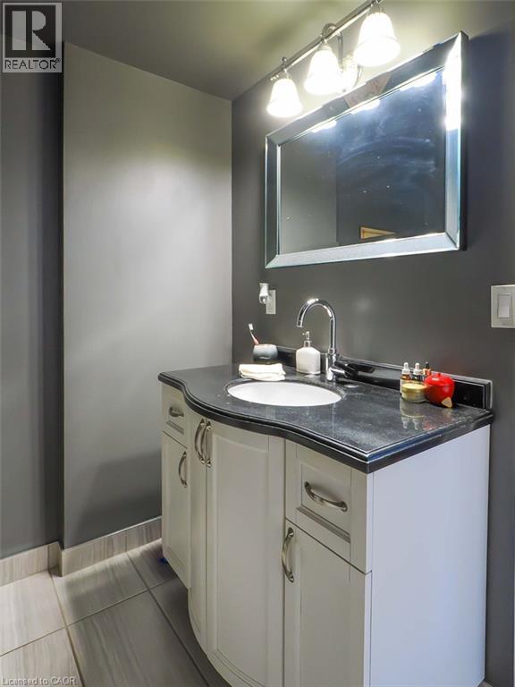 Upstairs bathroom off primary bedroom - 1635 Lakeshore Road, Clear Creek, ON