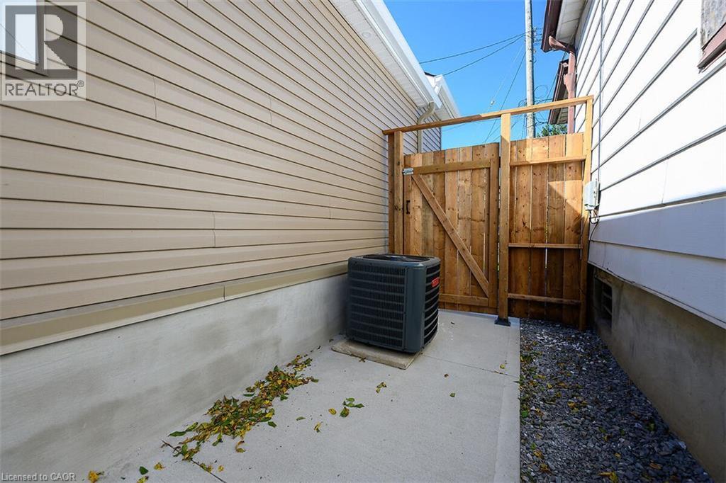 Wood privacy gate with sturdy timber construction - 4 Albemarle Street, Hamilton, ON