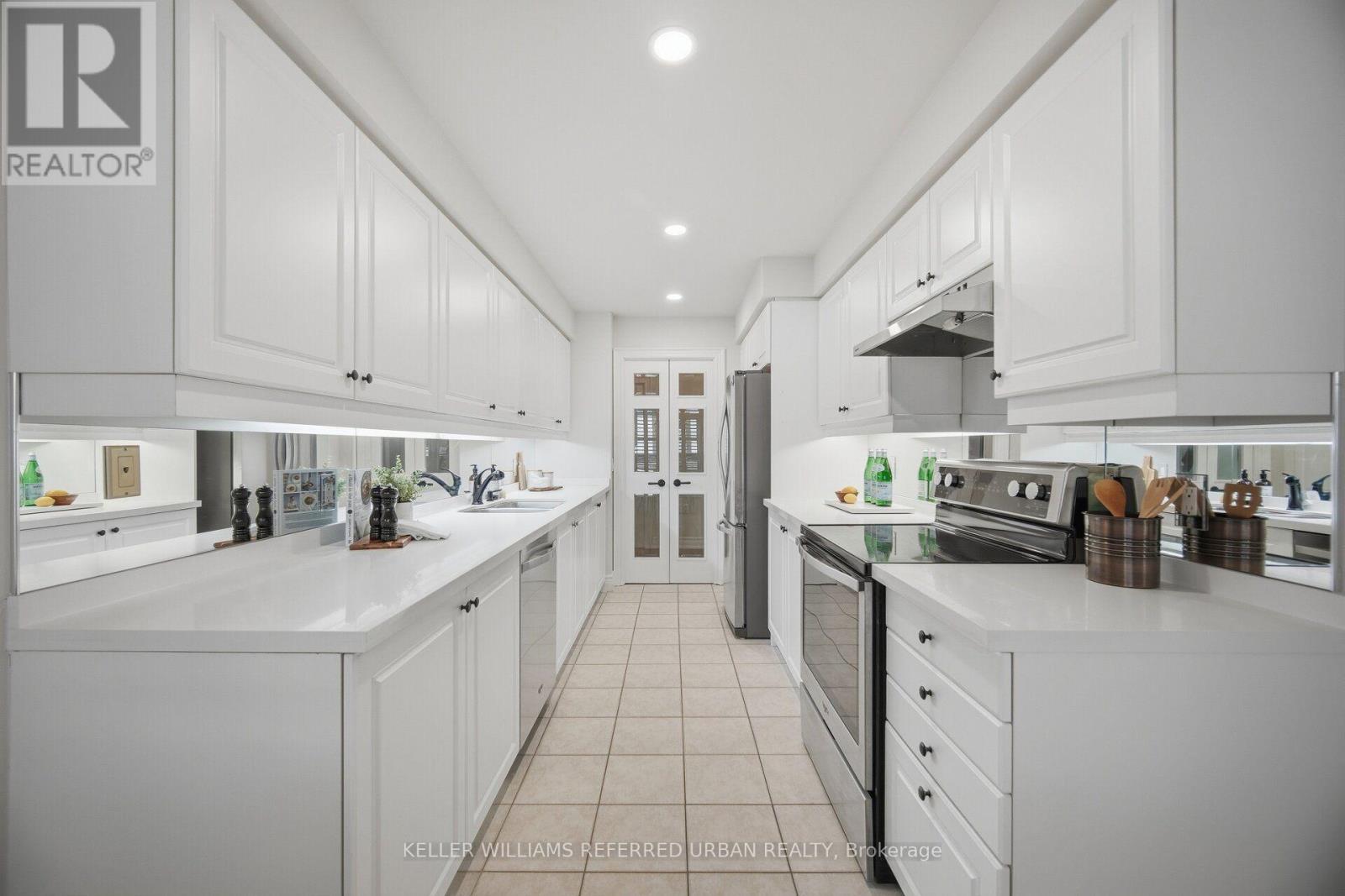 210 - 10 Old Mill Trail, Toronto, ON