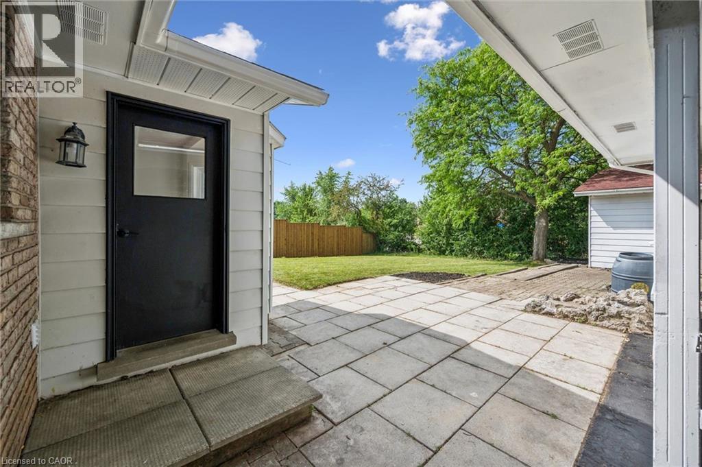 Expansive paver patio offering significant outdoor living space - 299 Dale Crescent, Waterloo, ON