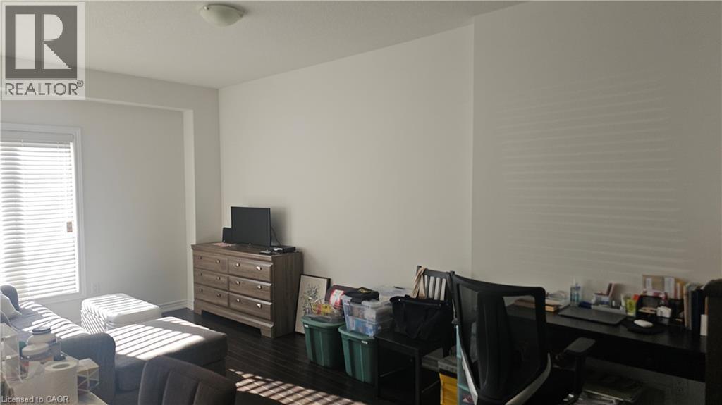 Recessed window with horizontal blinds, dark wood-finish flooring, and light-toned walls - 3 Sharp Drive, Ancaster, ON