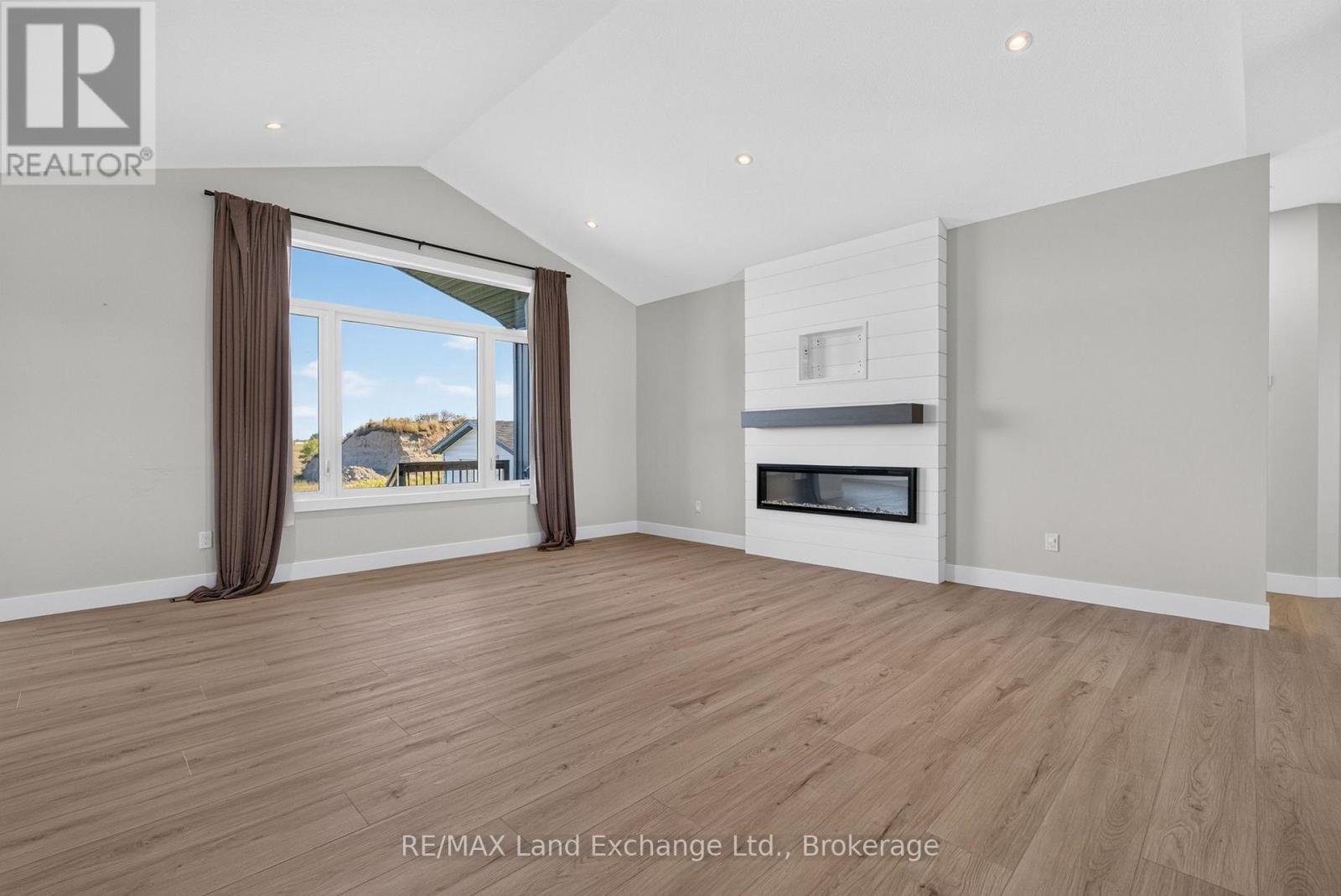 Living Room Overlooks Backyard - 48 Mctavish Crescent, Huron-Kinloss, ON