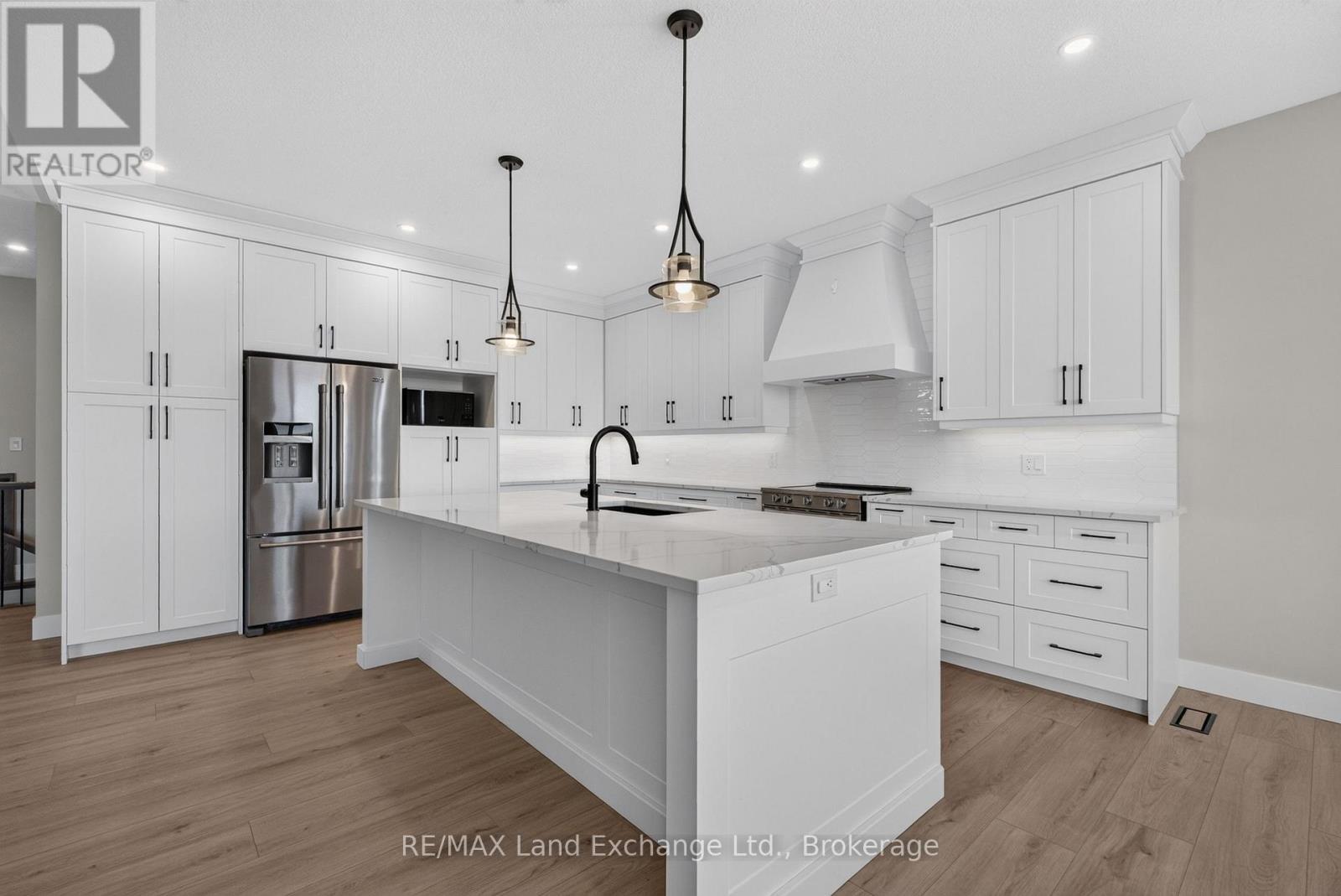 Kitchen Island has an Outlet - 48 Mctavish Crescent, Huron-Kinloss, ON