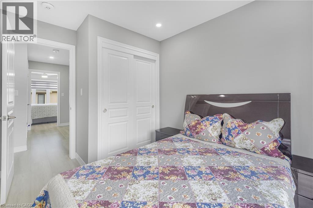 Recessed lighting, light wood-finish flooring, and white panel doors - 1890 Rymal Road E Unit# 144, Hamilton, ON