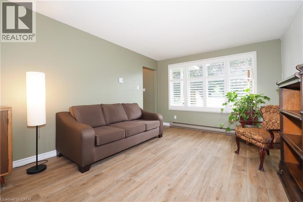 Living room with big front window - 219 Foxhunt Road, Waterloo, ON