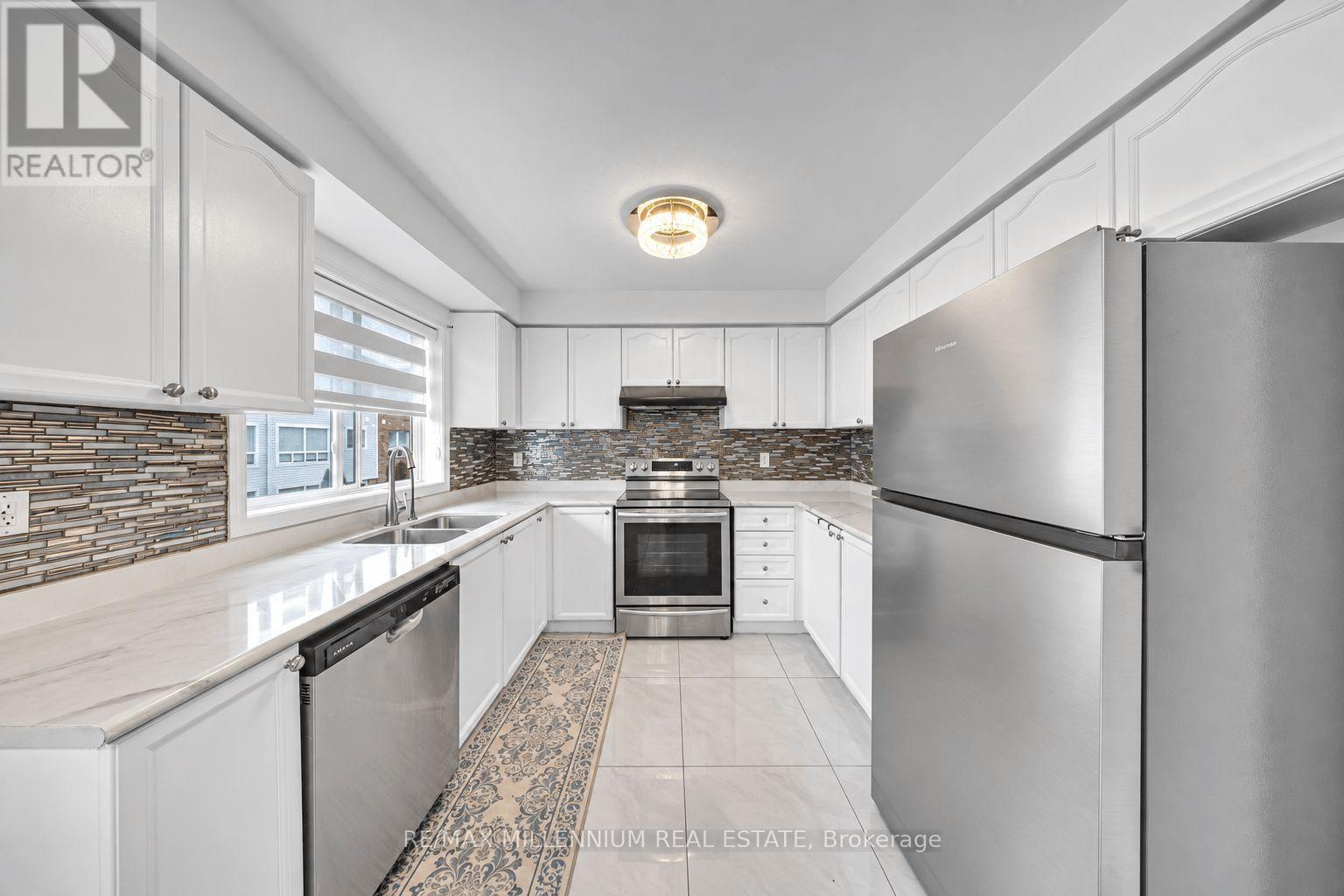 Kitchen with Stainless Steel Appliances - 39 Decker Hollow Circle, Brampton, ON
