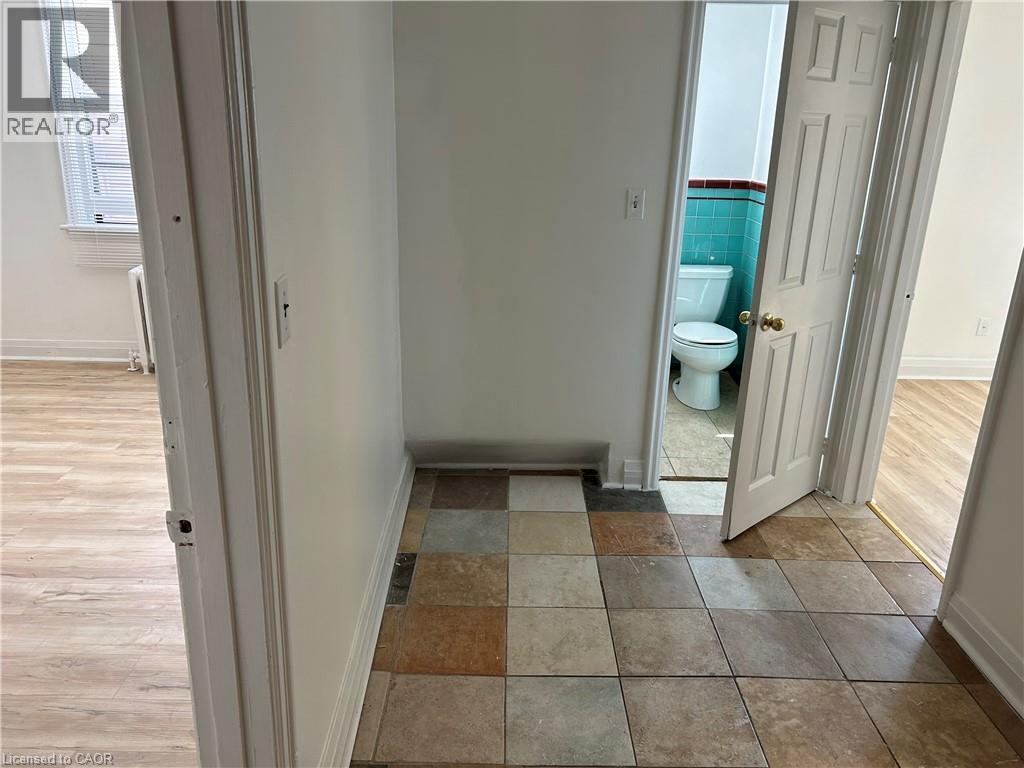 Multi-tone tile flooring - 689 Barton Street E, Hamilton, ON