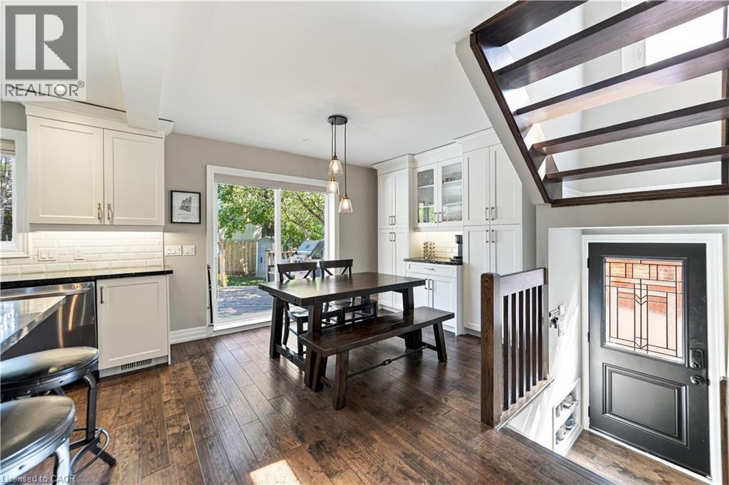 Separate side entrance, sliding glass doors to exit onto back deck. - 58 Uplands Avenue, Hamilton, ON