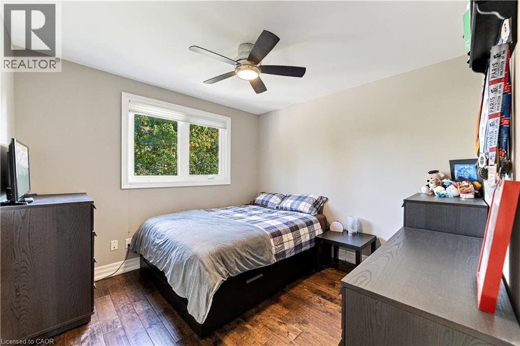 Fan, oversized window, hardwood flooring. - 58 Uplands Avenue, Hamilton, ON