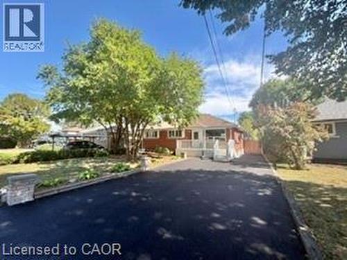 Brick exterior with white trim - 499 East 16Th Street, Hamilton, ON 