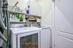 Main Floor Laundry in Bedroom Hallway -