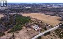 Expansive land parcel featuring open fields, wooded areas, and road frontage - 1720 Beaverdale Road, Cambridge, ON 