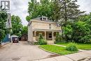 Two-story residence with a second-level balcony and main-level covered porch - 275 Main Street, Cambridge, ON 