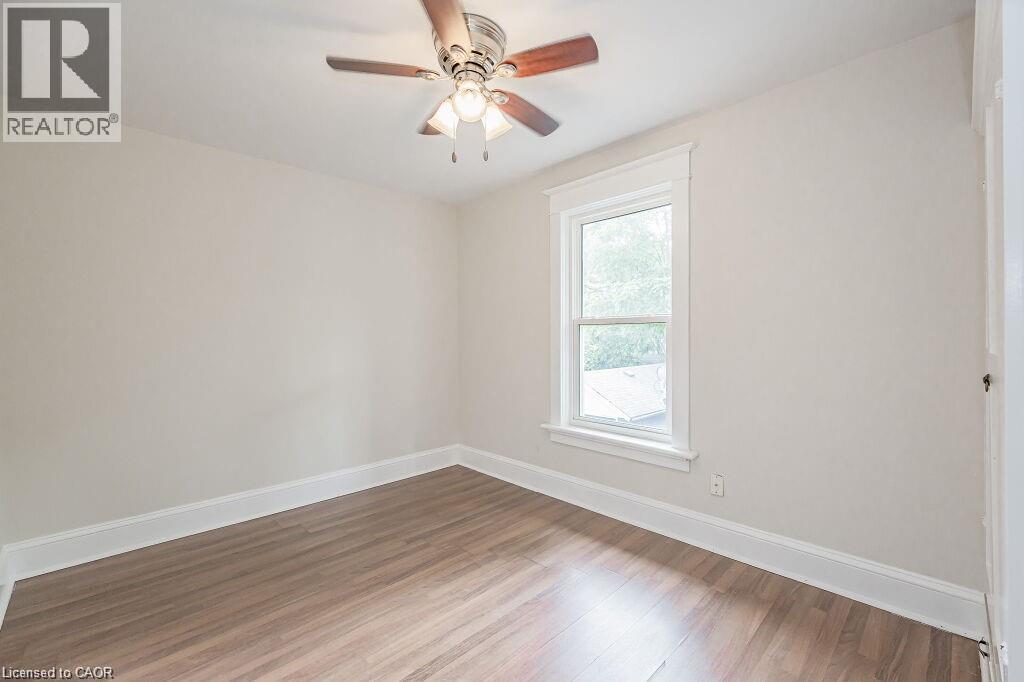 Wood-finish flooring, single window, and a ceiling fan - 275 Main Street, Cambridge, ON
