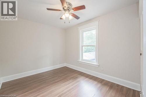 Wood-finish flooring, single window, and a ceiling fan - 275 Main Street, Cambridge, ON 