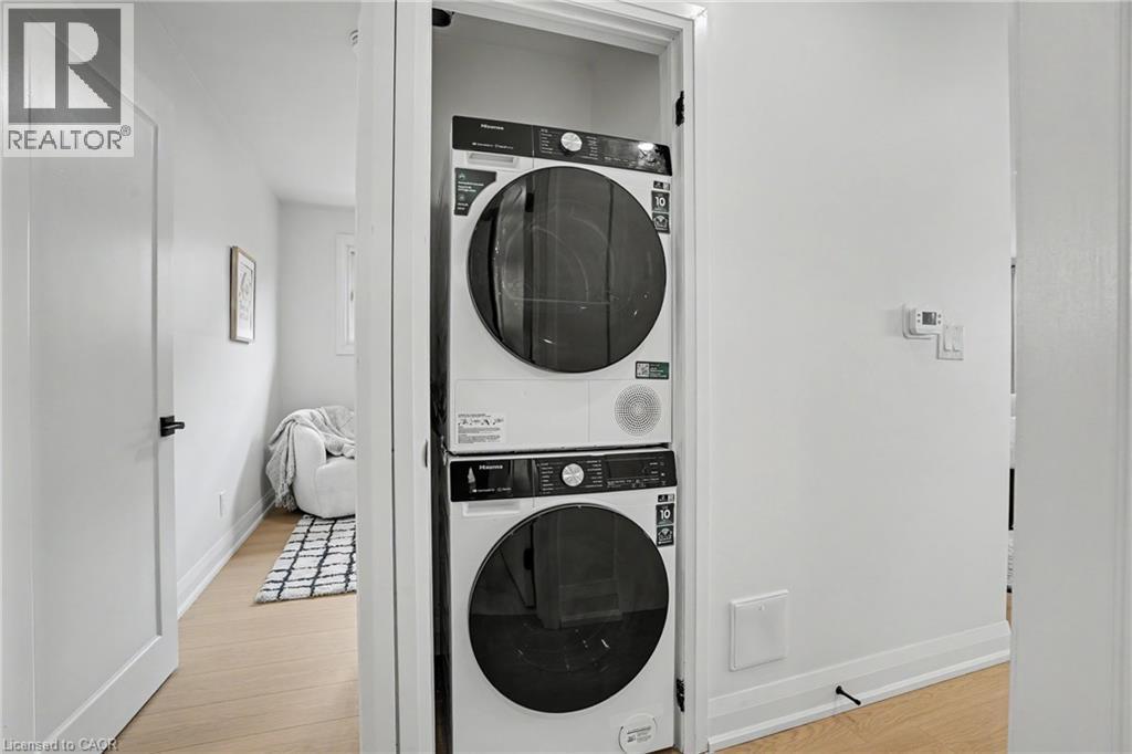 Stackable laundry appliances within an integrated closet - 311 East 14Th Street, Hamilton, ON