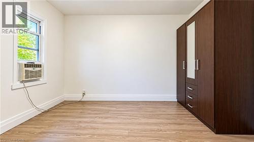 Wood-finish flooring with crisp white walls - 76 Avenue Road, Cambridge, ON 