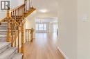 Wood-finish flooring throughout the main level - 61 Duckworth Road, Cambridge, ON 