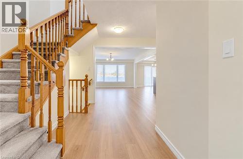 Wood-finish flooring throughout the main level - 61 Duckworth Road, Cambridge, ON 