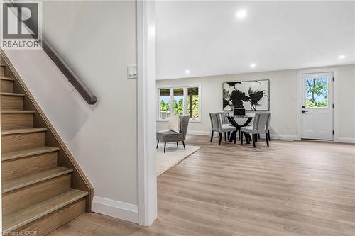 Stairs going o basement landing that lead to storage, the laundry room or rec room. - 46 Esther Avenue, Cambridge, ON 