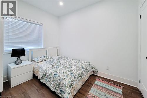 Recessed ceiling lighting, wood-finish flooring, white walls, and white window blinds - 78 Hillyard Street, Hamilton, ON 