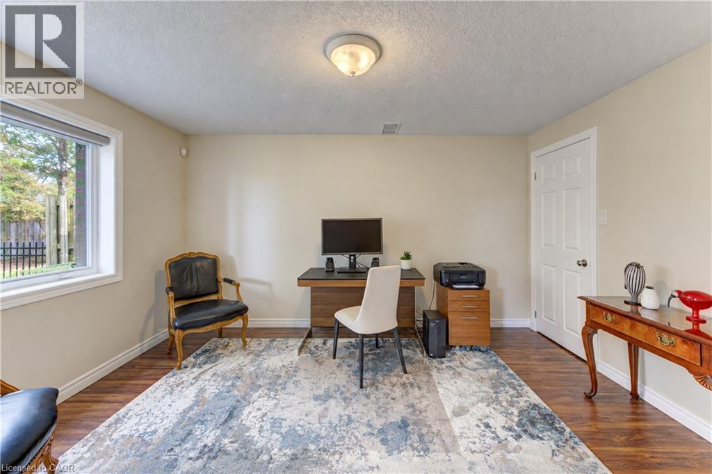 Lower level bedroom/office/gym with big window and closet. - 222 Chestnut Hill Crescent, Kitchener, ON
