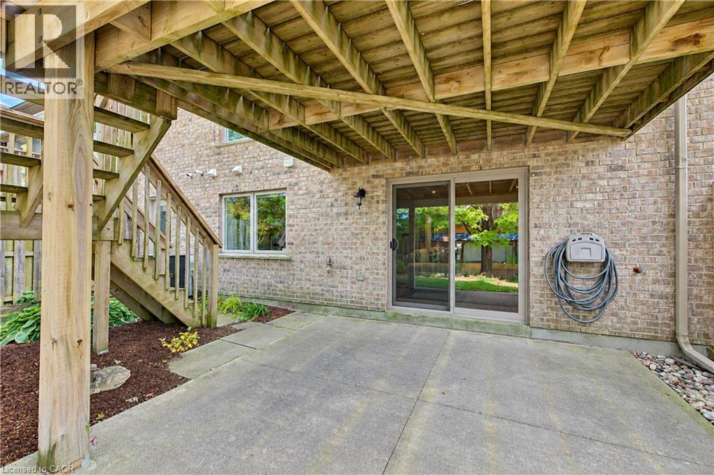 Concrete patio with gas BBQ hook up. - 222 Chestnut Hill Crescent, Kitchener, ON