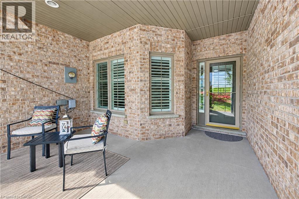 Big covered porch entry to unit. Enjoy your morning coffee! - 222 Chestnut Hill Crescent, Kitchener, ON