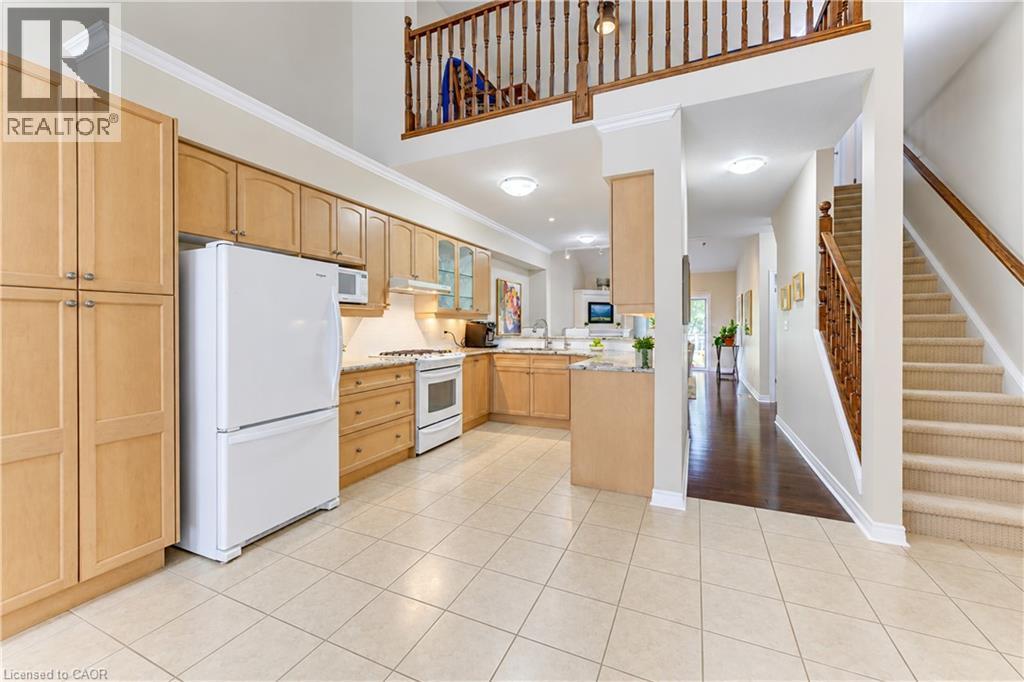 Light maple wood cabinets. - 222 Chestnut Hill Crescent, Kitchener, ON