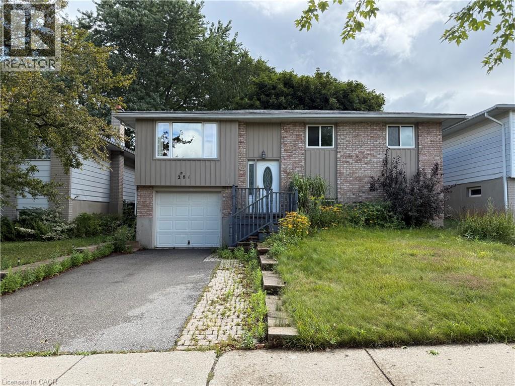 Brick and siding exterior with an integrated garage - 281 Toll Gate Boulevard, Waterloo, ON