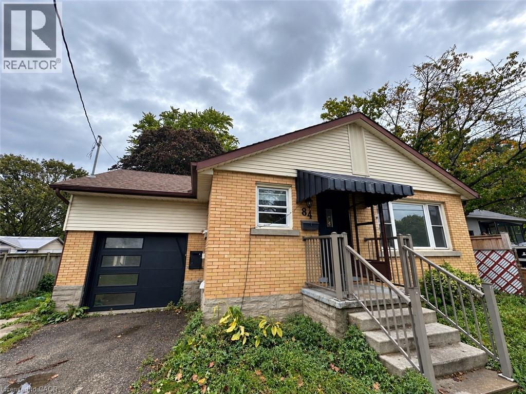 Brick exterior with light-colored siding accents - 84 Weber Street S, Waterloo, ON