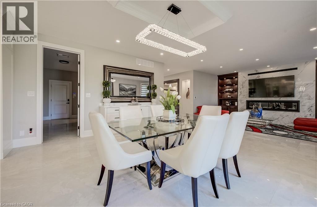 Large table seating can be seen here - 61 Schweitzer Street, Kitchener, ON