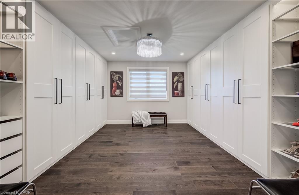 WOW!!!!! Sharable his & hers walk-in closet with custom organizer cupboards having pull out drawers - 61 Schweitzer Street, Kitchener, ON
