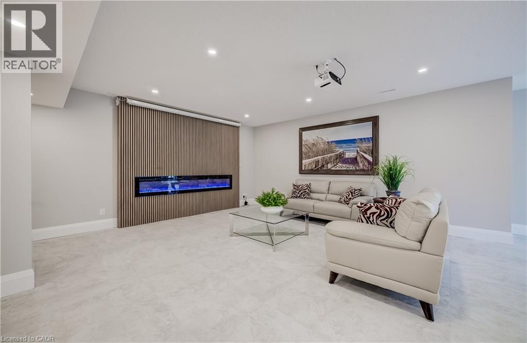 Horizontal electric fireplace, screen & projector included - 61 Schweitzer Street, Kitchener, ON