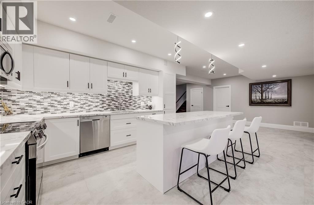 Lower level Kitchen ready for a party - 61 Schweitzer Street, Kitchener, ON