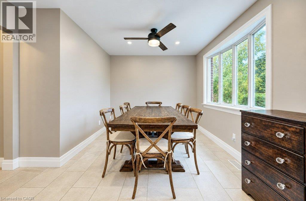 Recessed lighting complements a wood-finish ceiling fan - 37 Margaret Avenue N, Waterloo, ON
