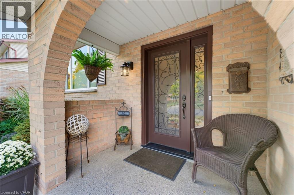 Brick facade with arched entry - 77 Yellow Birch Drive, Kitchener, ON