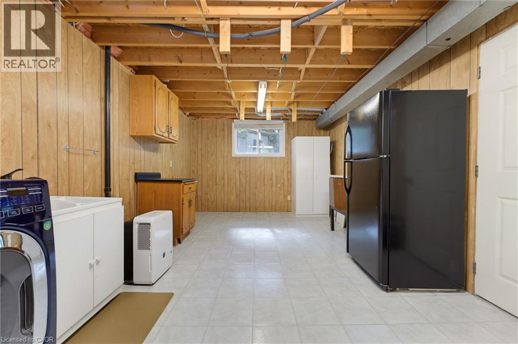 Utility room with abundant storage space. - 77 Yellow Birch Drive, Kitchener, ON