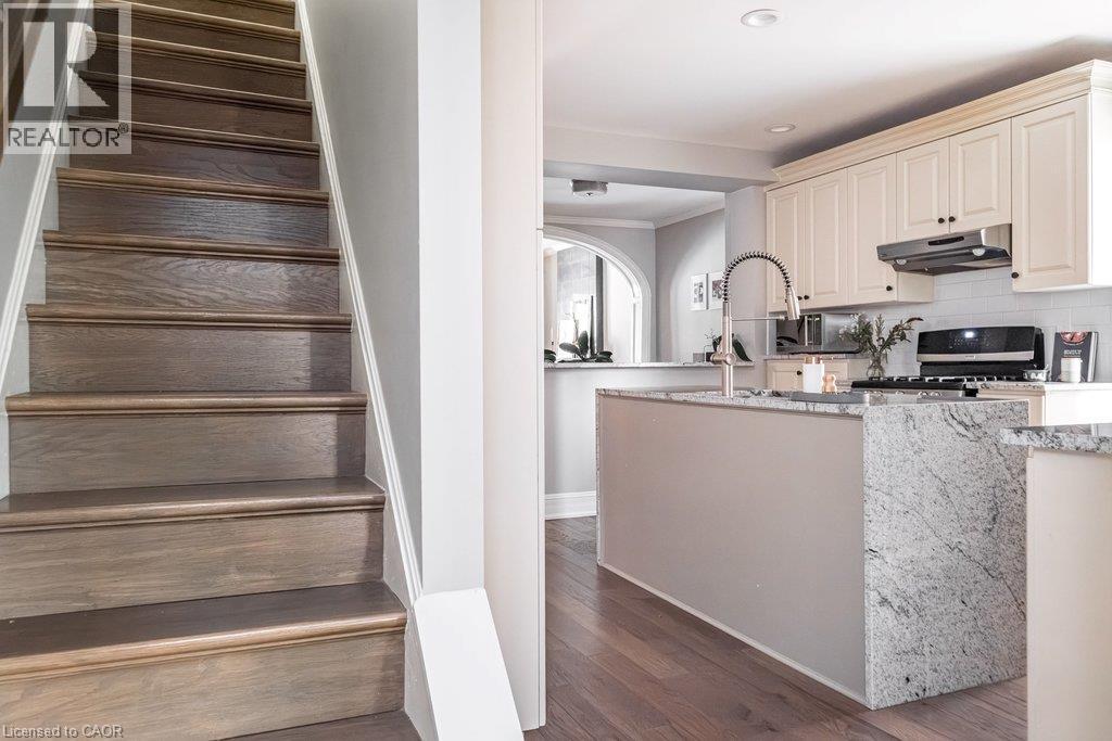 Convenient butler stairs, located off the kitchen. - 132 Herkimer Street, Hamilton, ON