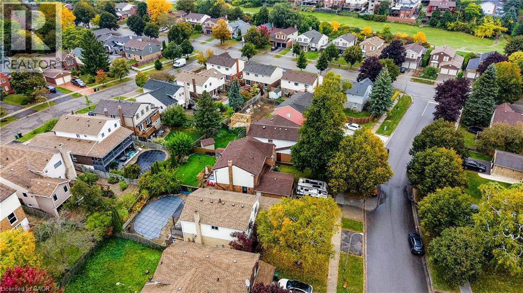 Residential neighborhood with diverse home styles - 104 Deerwood Crescent, Kitchener, ON