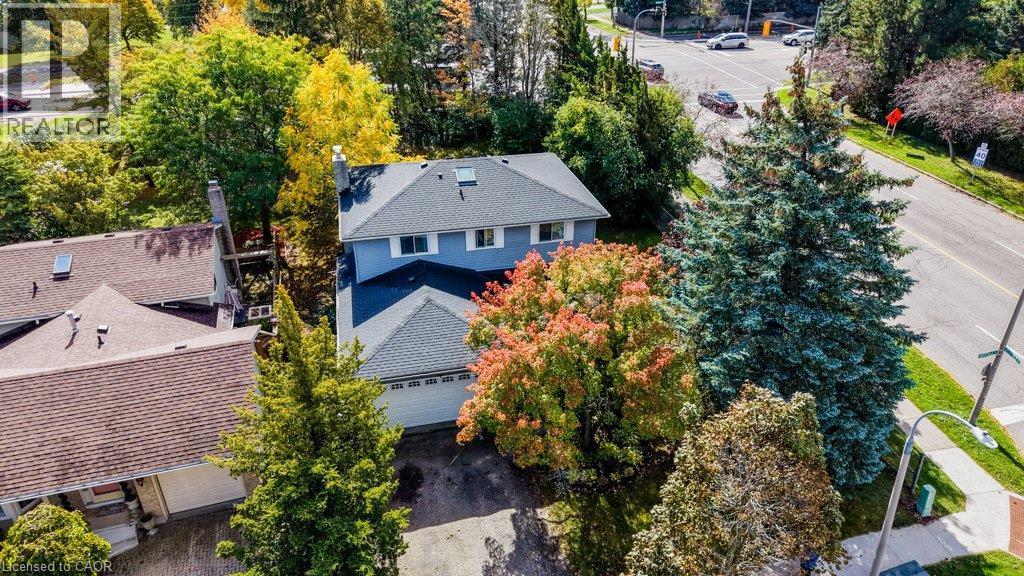 Set on a .23 acre corner lot - 469 Westvale Drive, Waterloo, ON