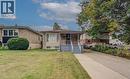 Stone facade home with a covered front entrance and front porch - 465 Herkimer Street, Hamilton, ON 
