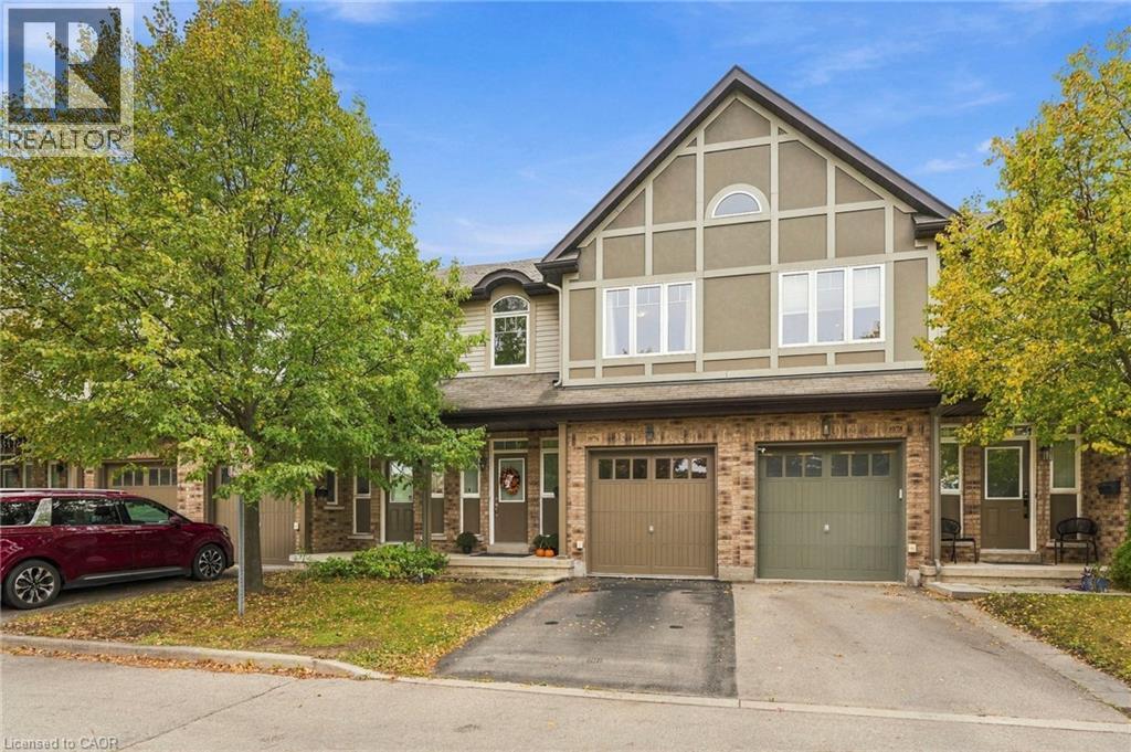 Brick and stucco facade with pitched roofline - 1076 Ryckman Common, Burlington, ON