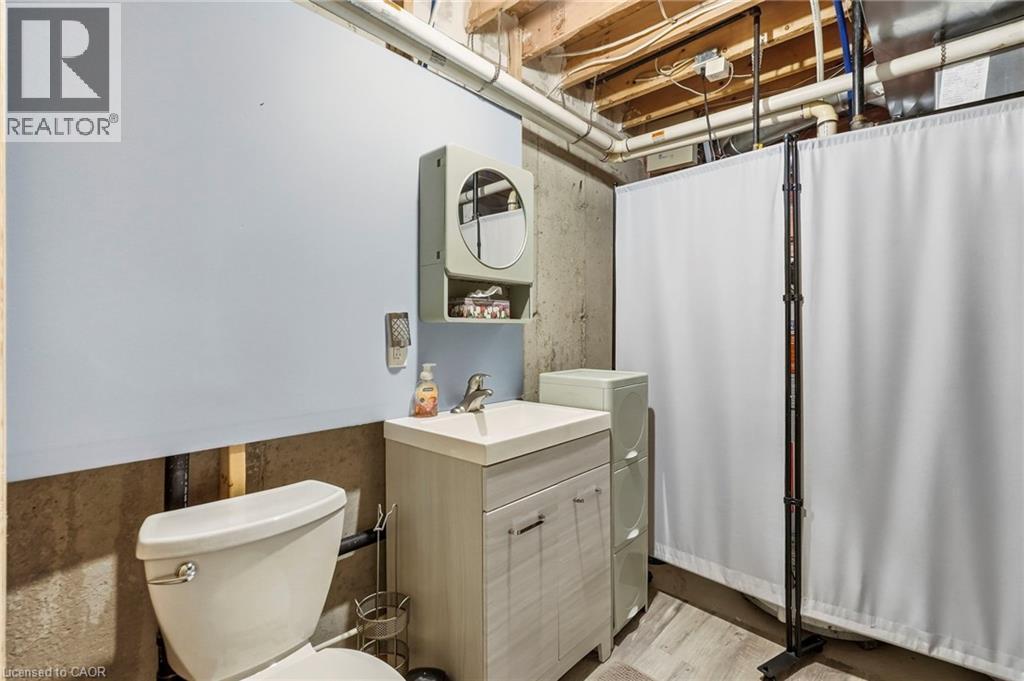 White toilet fixture - 1076 Ryckman Common, Burlington, ON