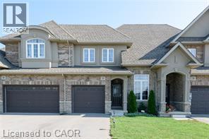 Stone and stucco exterior with multiple gables - 28 Madonna Drive, Hamilton, ON