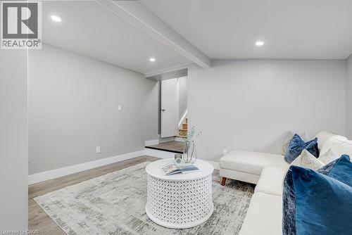 Recessed ceiling lighting, light wood-finish flooring, and white trim - 125 Cathcart Street, Hamilton, ON 