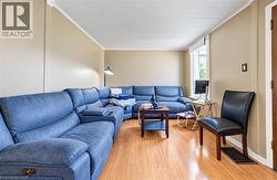 Light-toned walls complement wood-finish flooring -
