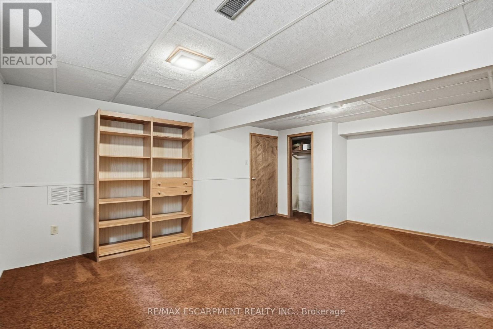 In bsmnt, cold storage access under front porch. - 36 Algonquin Court, Hamilton, ON