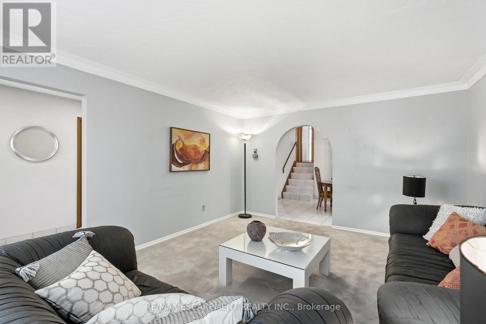Looking towards dining rm stairs to upper level - 36 Algonquin Court, Hamilton, ON