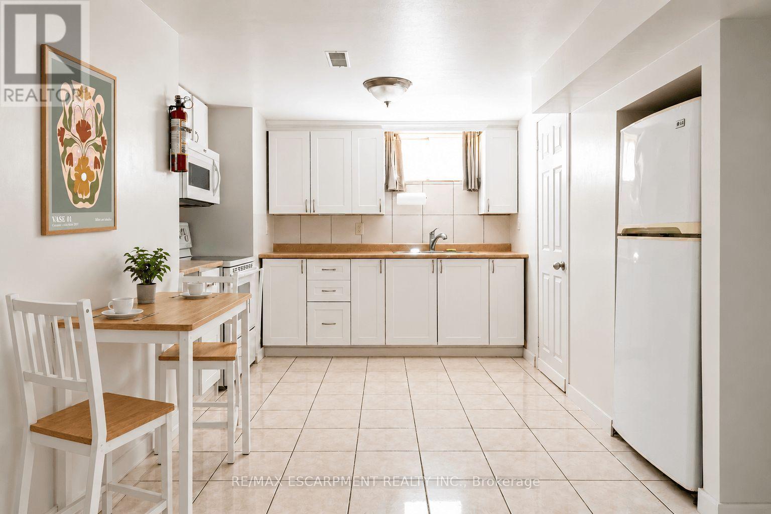 Basement Kitchen Virtually Staged - 548 Beach Road, Hamilton, ON